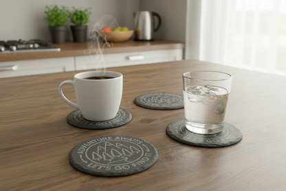 Exactly 4 Adventure Awaits Coasters on Kitchen Table